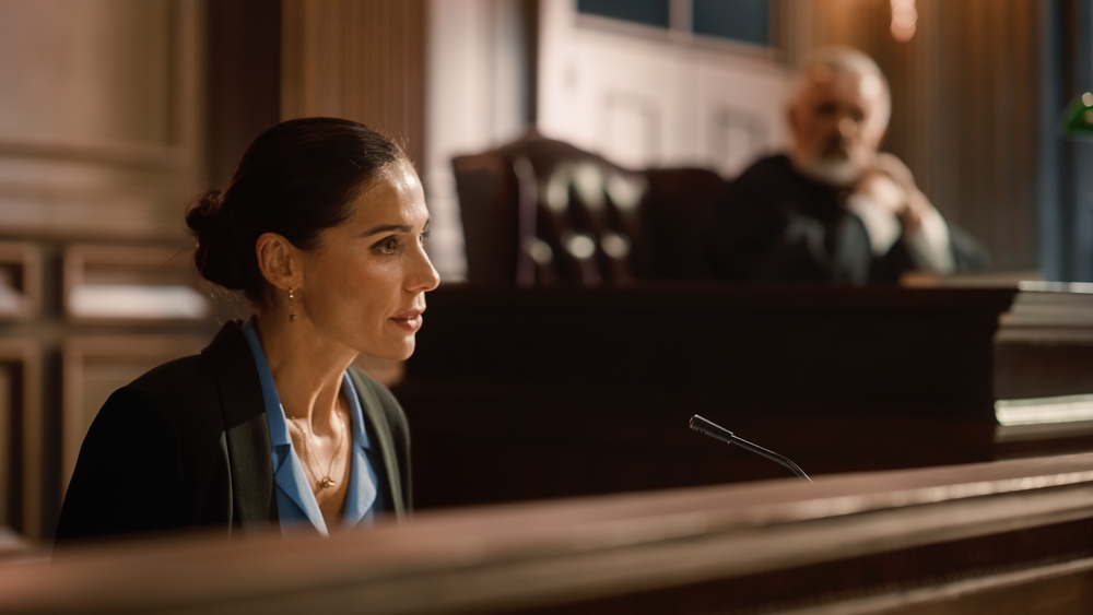 Court of Law and Justice: Portrait of Beautiful Female Victim Giving Heartfelt Testimony to Judge, Jury. Emotional Speech of Empowered Woman against Crime, Injustice, Prejudice, Corruption.