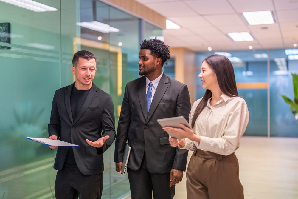 professionals reviewing estate planning and life insurance.