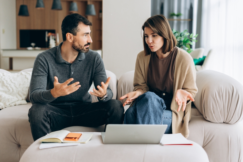 Couple having a serious conversation about important family and financial matters